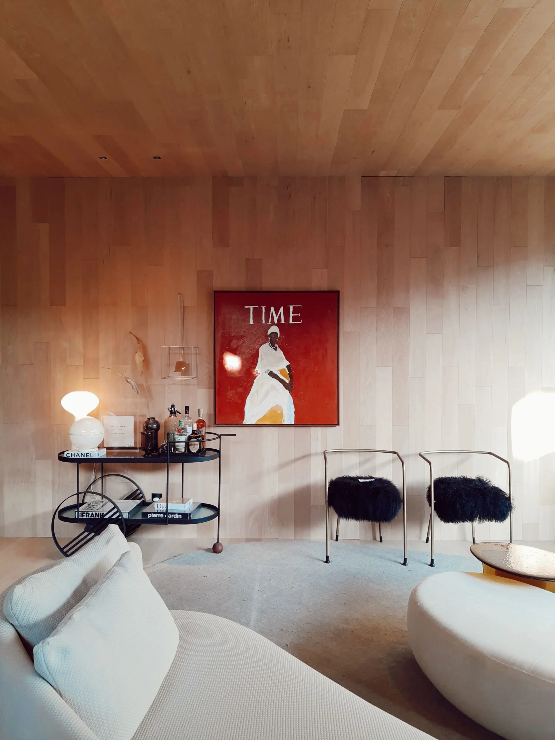 Parisian-inspired elegant living room with classic architectural details and modern furniture