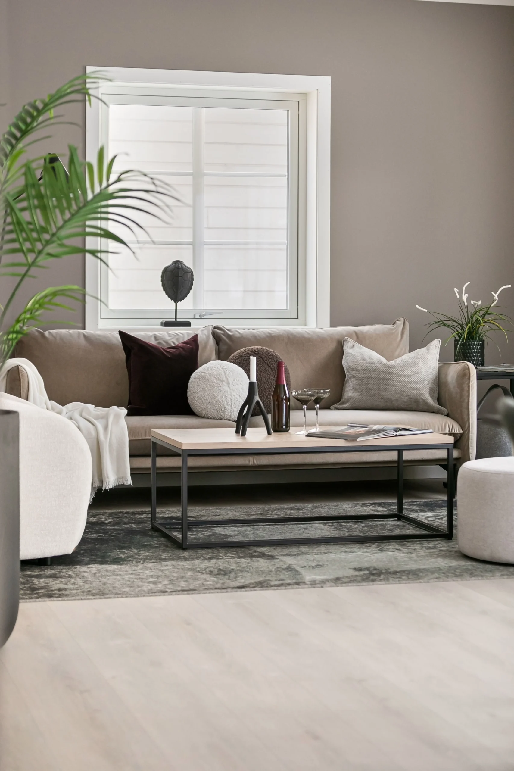 Layered linen wood and woven textures in an expensive-looking home