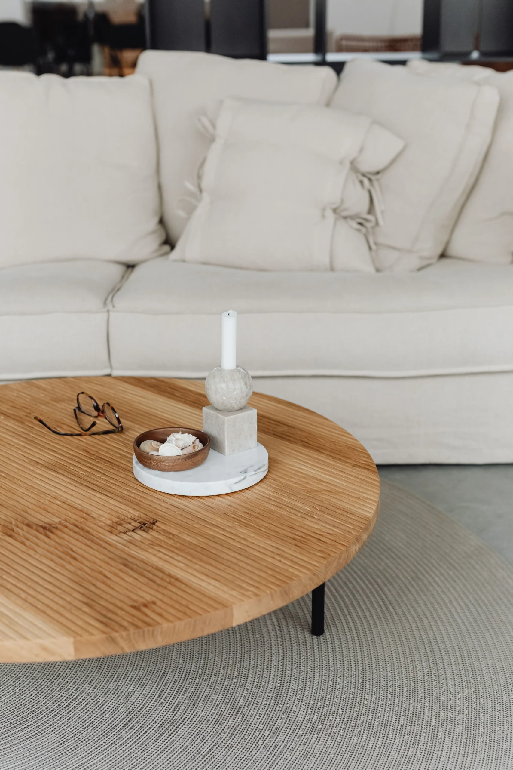 Earthy natural living room with warm neutral furniture, wood and organic textures